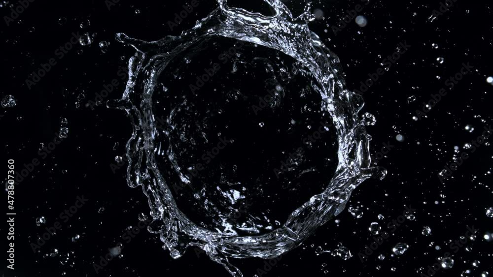 Super Slow Motion Shot of Rotating Water Ring Moving Towards Camera at 1000fps.