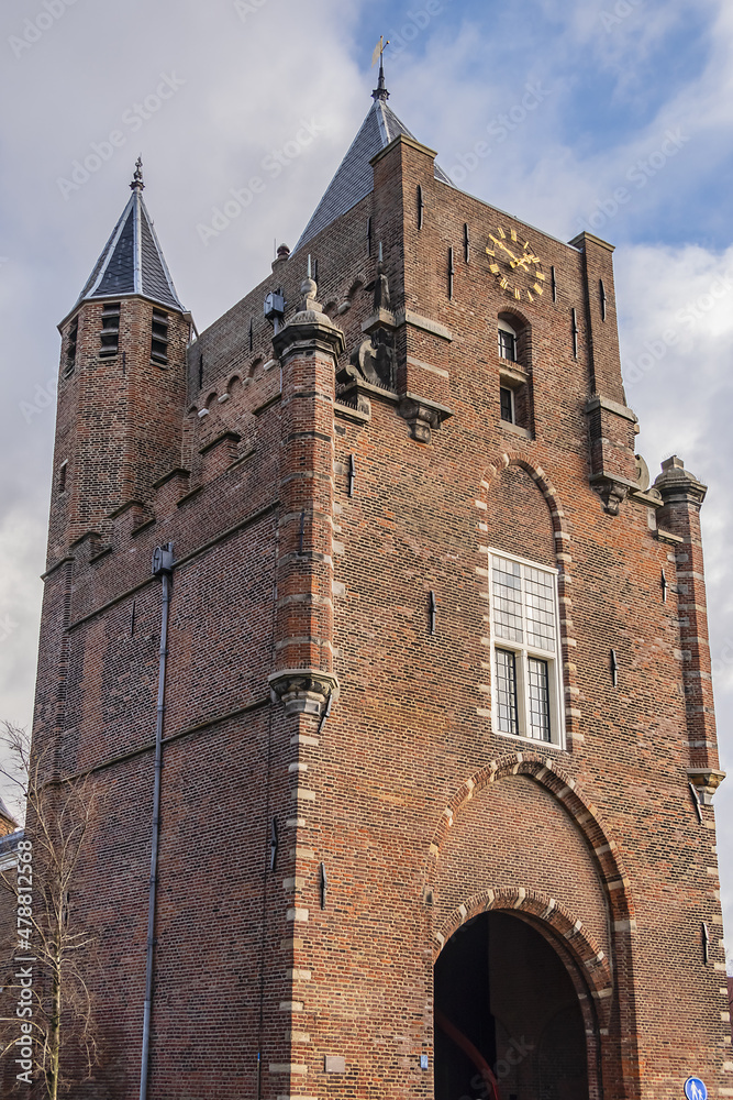 Amsterdamse Poort (or Spaarnwouder Poort, 1355), old city gate of Haarlem. The brick gate with towers is at the end of old route from Amsterdam to Haarlem. Haarlem, North Holland, the Netherlands.
