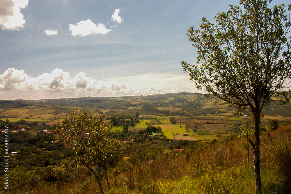A valley of farmlands and crop fields near the town of Barichara in the eastern Andes range of central Colombia. A valley of farmlands and crop fields near the town of Barichara in the eastern Andes range of central Colombia.