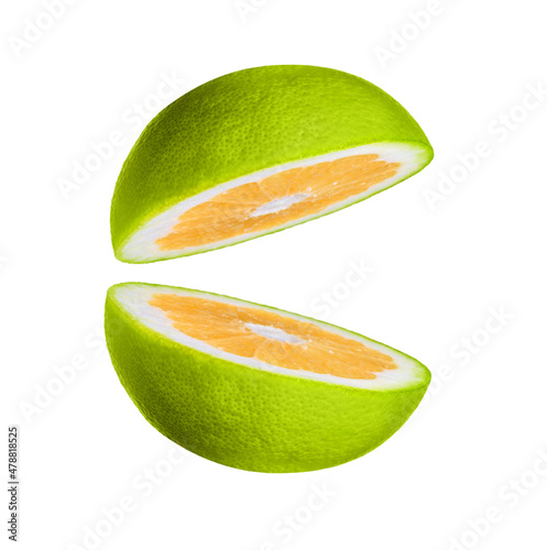 two halves of citrus sweetie, green grapefruit isolated on white
