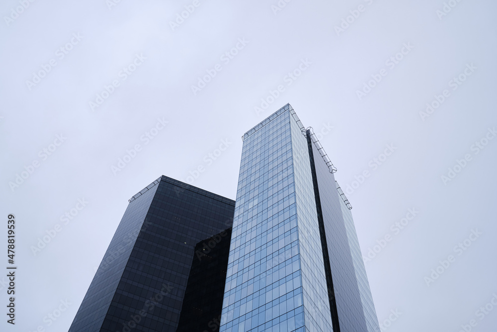 View of modern skyscrapers in the city's business district. Modern glass business buildings in the city center