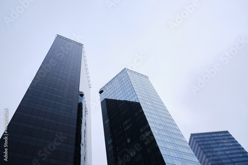 View of modern skyscrapers in the city s business district. Modern glass business buildings in the city center