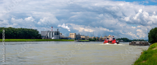 panoramic view of the river Danube near the village of Zwentendorf with chemical plant and cargo vessels, Austria photo