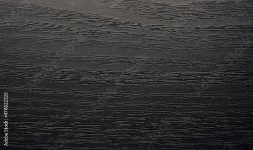 Fotografija Photo of an ebony texture. The wooden background is black.