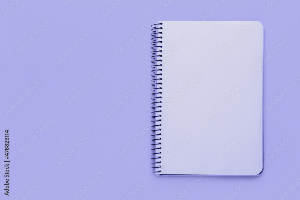 Trendy very peri color of the year 2022, violet blue, lavender open spiral notebook with blank empty sheets with copy space Trendy very peri color of the year 2022, violet blue, lavender open spiral notebook with blank empty sheets with copy space