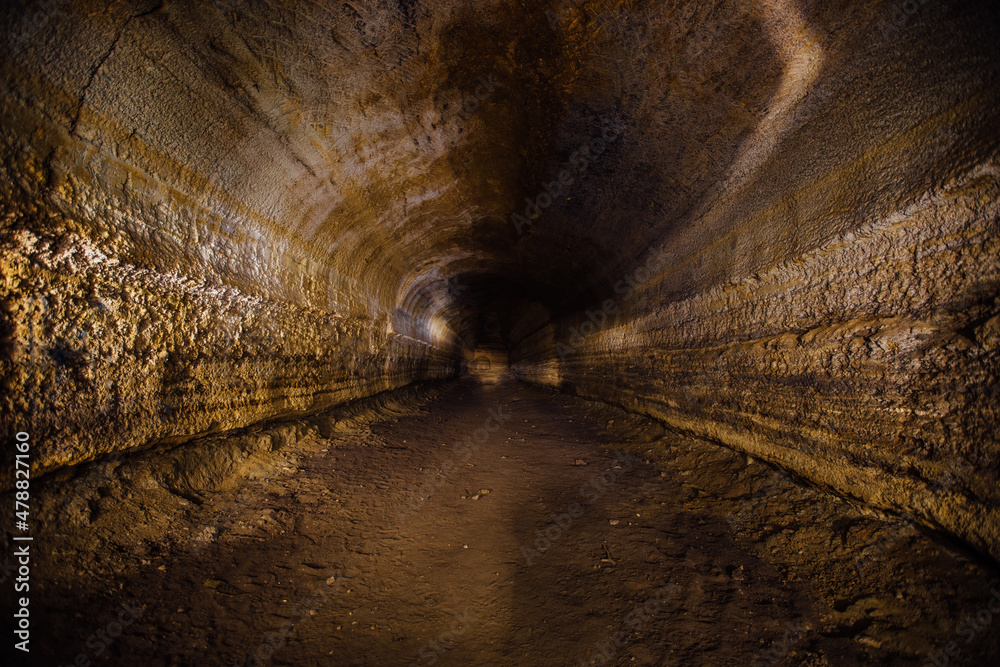 Abandoned prospecting adit. Tunnel at limestone at abandoned mine foto