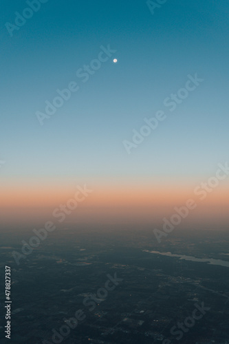 Moon Over Sunrise from the Plane in Charlotte