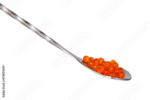 Red caviar in silver spoon isolated on the white background