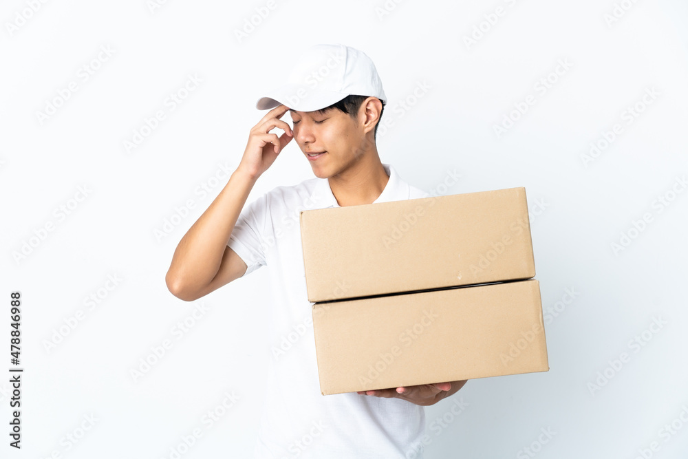 Delivery Chinese man isolated on white background laughing Delivery Chinese man isolated on white background laughing