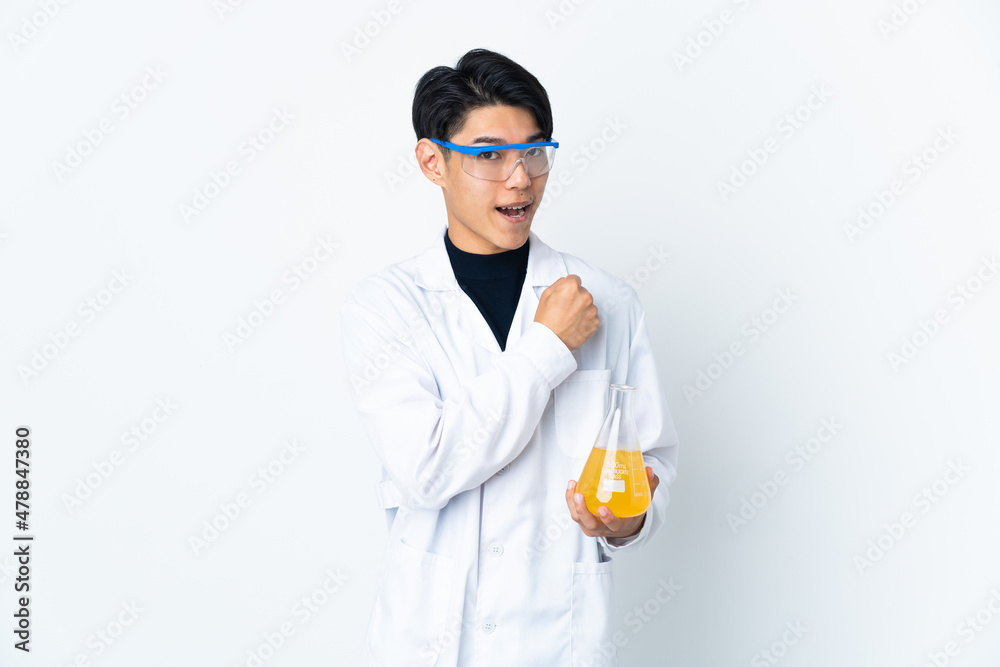 Young Chinese scientific man isolated on white background celebrating a victory Young Chinese scientific man isolated on white background celebrating a victory