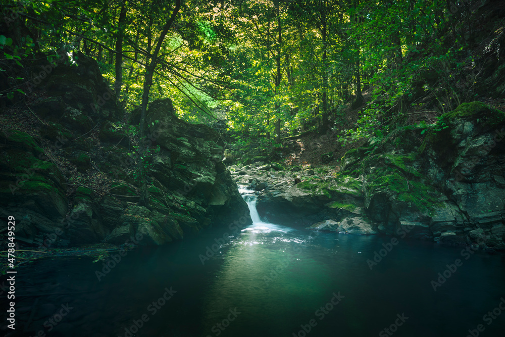 Waterfall in Acquerino nature reserve forest. Tuscany region, Italy.