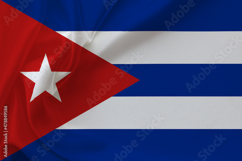 Cuba flag on waving silk background. Fabric texture. Free Download Cuba flag on waving silk background. Fabric texture. - GFXLoad