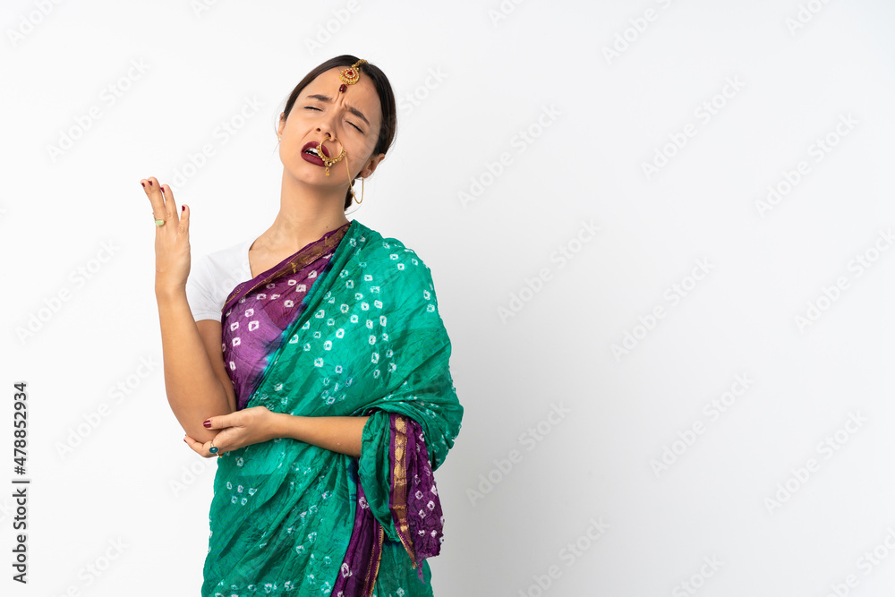 Young indian woman isolated on white background with tired and sick expression Young indian woman isolated on white background with tired and sick expression