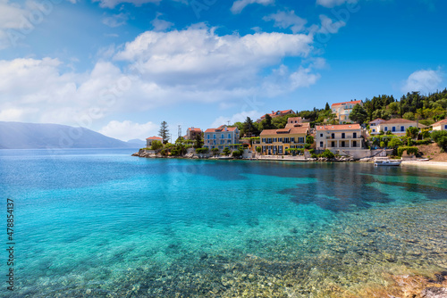 The bay of Fiscardo  village and sailors paradise at the north side of Kefalonia island  Greece  with turquoise sea and colorful houses