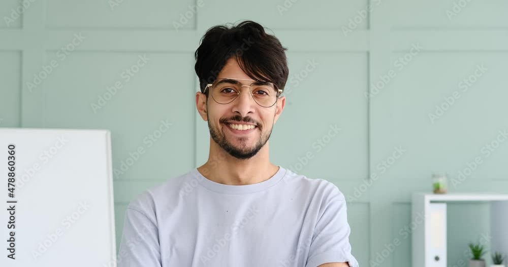 Portrait of businessman smiling at office
