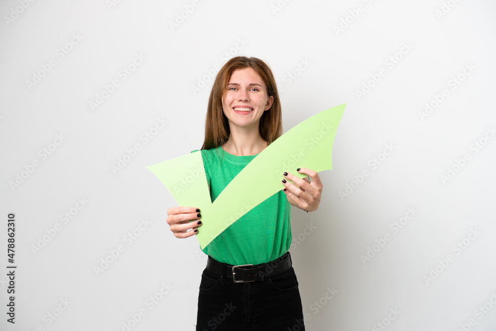 Young English woman isolated on white background holding a check icon with happy expression Young English woman isolated on white background holding a check icon with happy expression