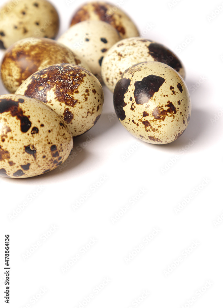 Quail eggs isolated on white background. Healthy food concept. Selective focus
