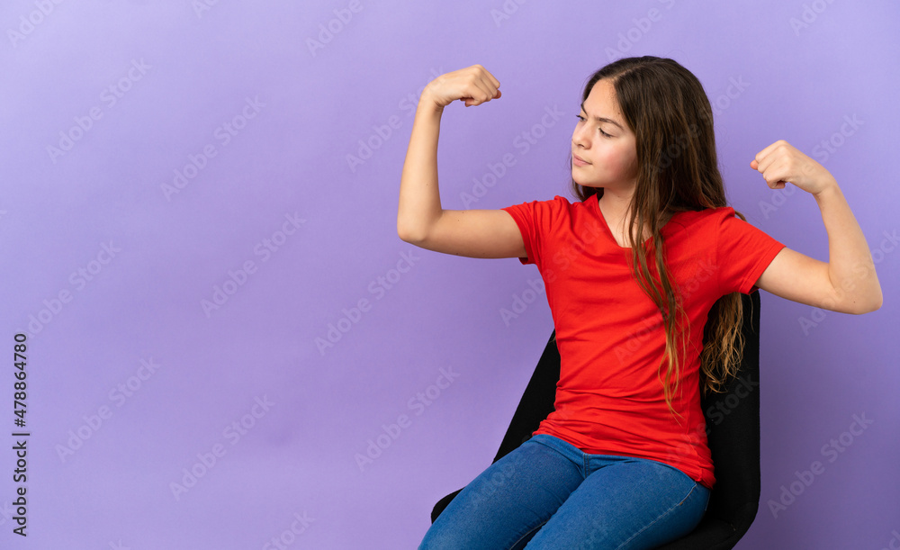 Little caucasian girl sitting on a chair isolated on purple background doing strong gesture