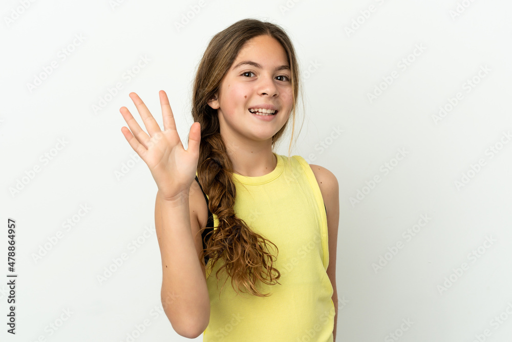Little caucasian girl isolated on white background saluting with hand with happy expression Little caucasian girl isolated on white background saluting with hand with happy expression