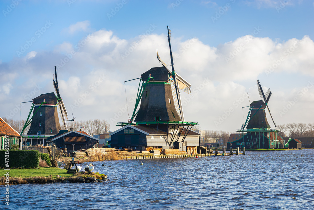 Windmills along the waterside at Zaanse Schans, Netherlands