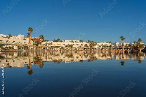 Calm beach on the red sea of Sharm El Sheikh during sunrise, Egypt