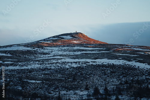 Last sunlight hitting a mountain peak in Nesbyen, Norway 