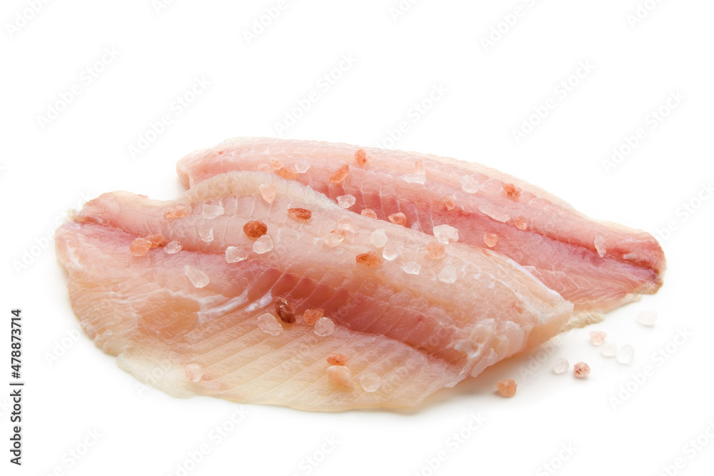 Prepared raw white fish fillet sprinkled with pink salt Prepared raw white fish fillet sprinkled with pink salt