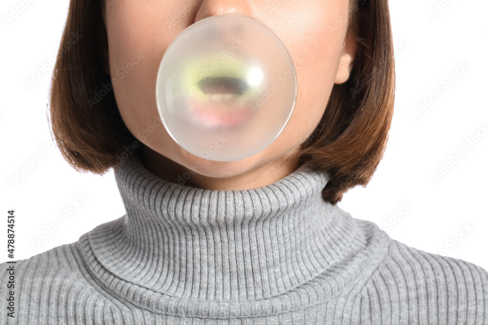 Young woman with chewing gum on white background, closeup Young woman with chewing gum on white background, closeup