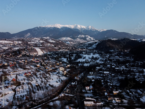 Bucegi Mountains seen from the city of Bran, Romania. Beautiful winter landscape. Part of the Carpathians Mountain Range.