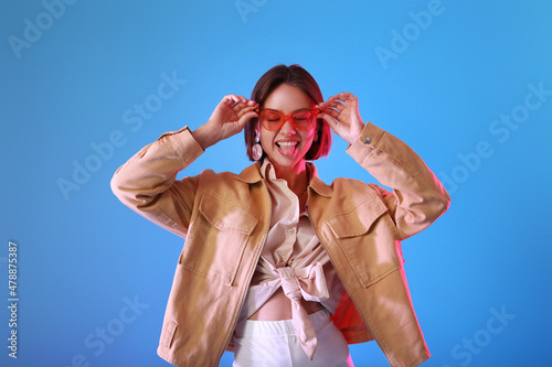 Funny young woman in stylis...