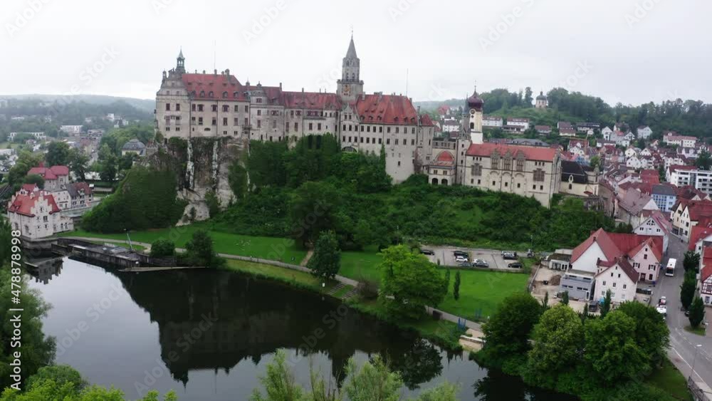 Aerial Sigmaringen Castle In Town Against Sky, Drone Flying Forward Over Lake Aerial Sigmaringen Castle In Town Against Sky, Drone Flying Forward Over Lake