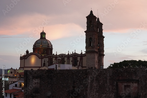 A view of Santa Prisca church in Taxco, beautiful sunset photo