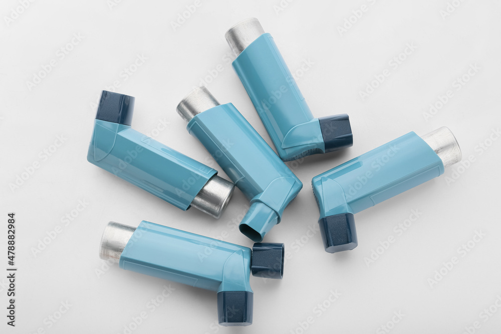 Asthma inhalers on white background Asthma inhalers on white background