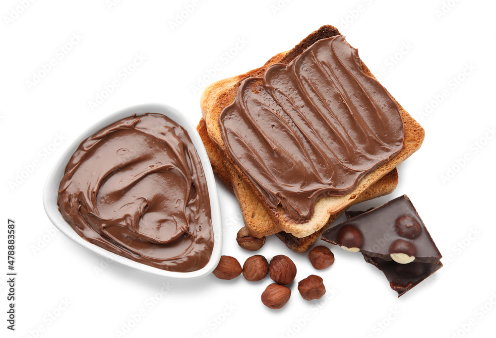 Bread with chocolate paste and hazelnuts on white background Bread with chocolate paste and hazelnuts on white background