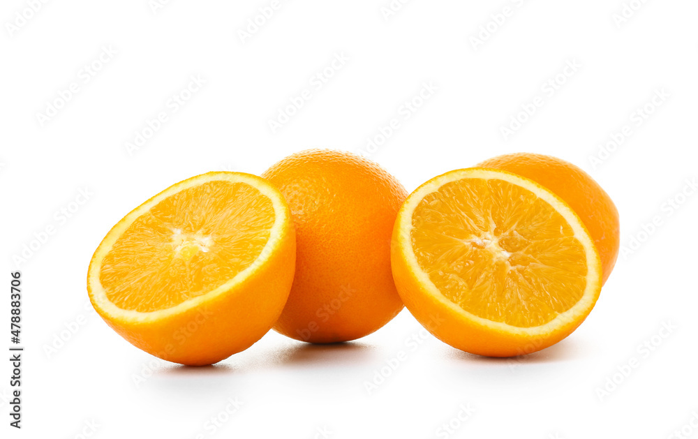 Fresh ripe cut oranges on white background