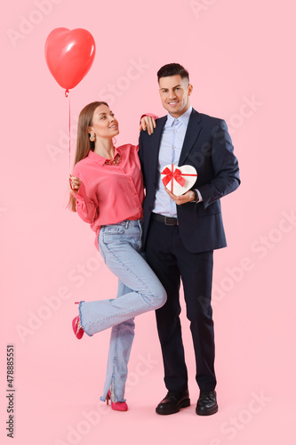 Happy young couple with gif...