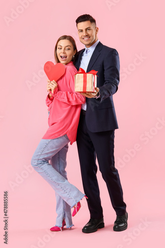 Happy young couple with gif...