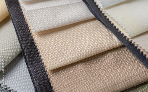 Samples of fabrics in beige tones. Burlap samples for designers