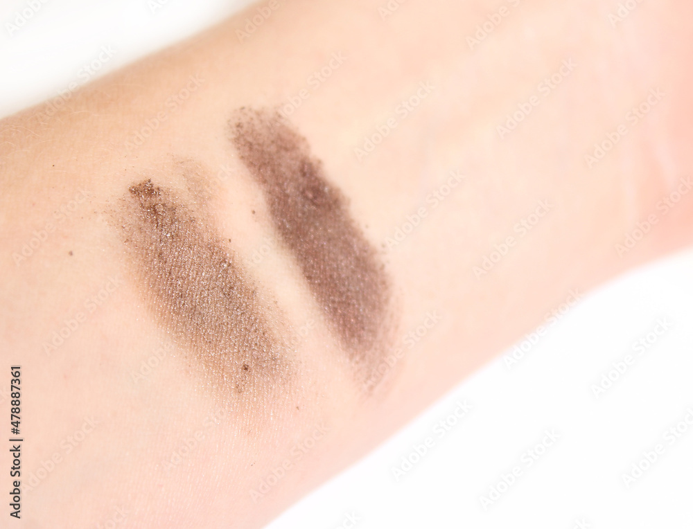 Fototapeta premium Cosmetics Sample Test on Womans Arm Warm Colors