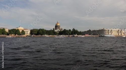 St. Petersburg, Russia - the 9th of June 2021, The view of the Saint Isaac's Cathedral, Admiralty spire and the building complex of the former Senate and Synod from the other bank of the Neva river