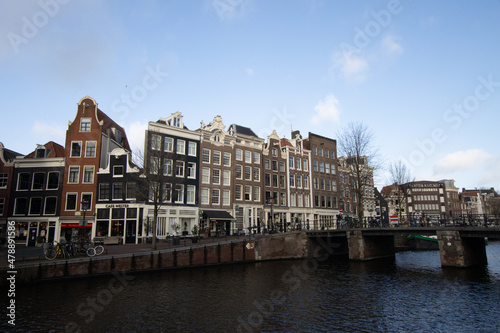 Houses and blue sky in Amsterdam, The Netherlands. Dutch architecture © PAOLO