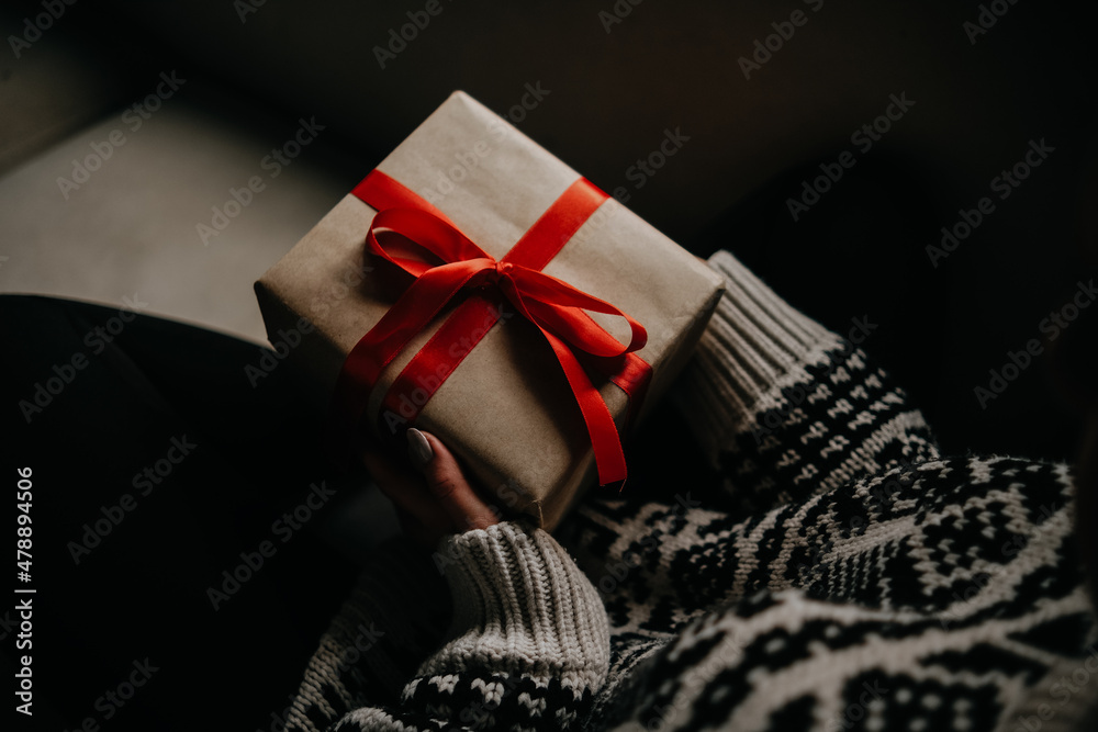 gift package in woman's hand gift package in woman's hand