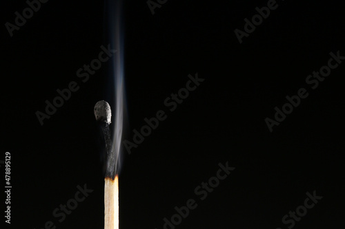 A match burned with an orange flame and produces heat 