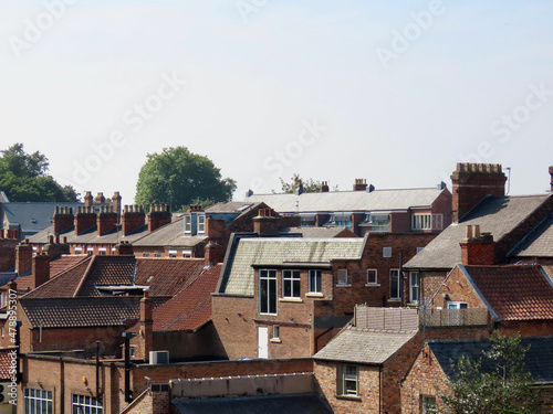 Fotografering Roofs of traditional English red brick houses