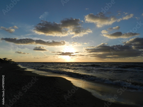 Beautiful sunset on the Baltic Sea. A walk along the seashore during your vacation. Perfect wallpaper.