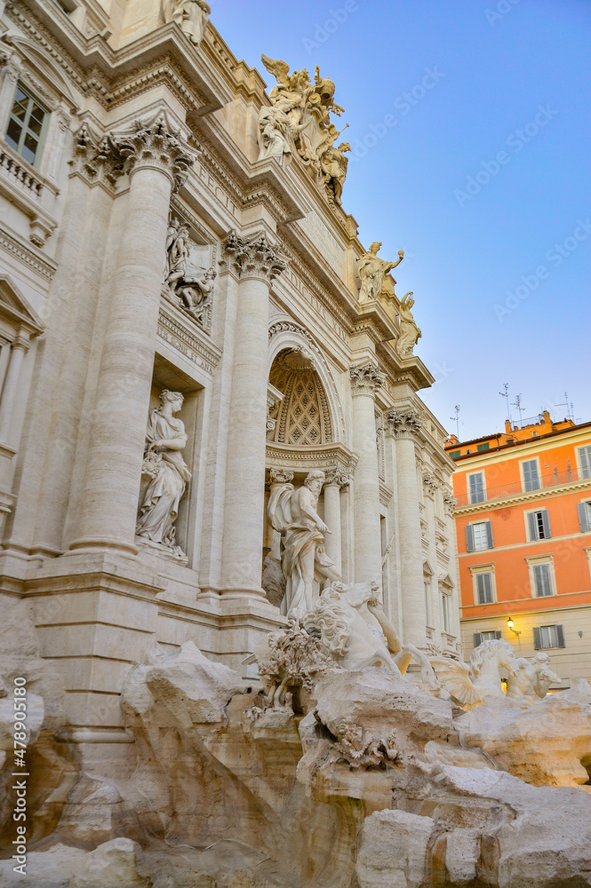 The Trevi Fountain in the Trevi district in Rome, Italy, in the evening