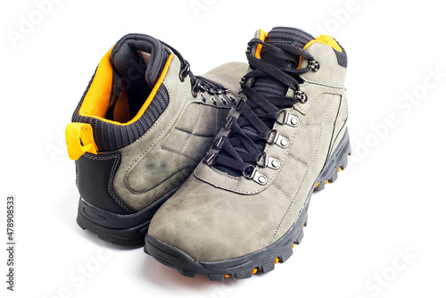 hiking boots isolated on a withe background made of leather and waterproof and breathable membrane