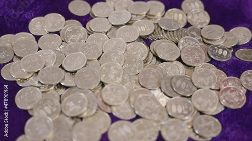 500 Yen Coins, Thousands of Dollars in Japanese Currency photo