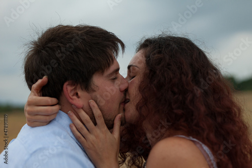 Young Couple kissing photo