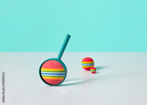 Colored ball in magnifying glass